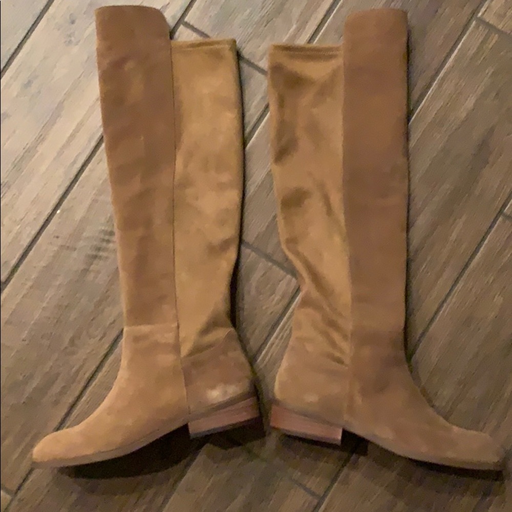 Brand new never been worn sole brown boots.